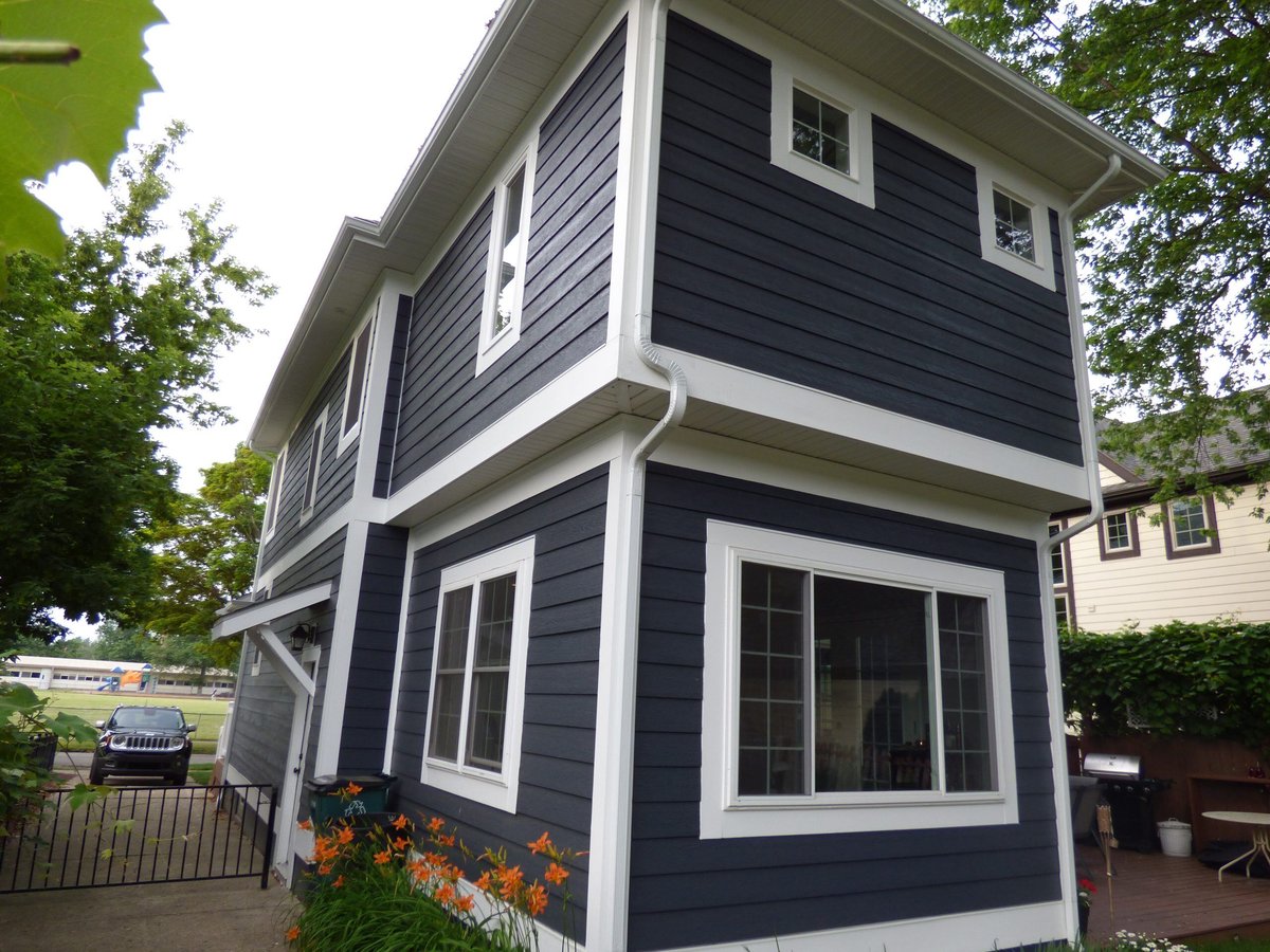 blue and white home addition in oakland county michigan